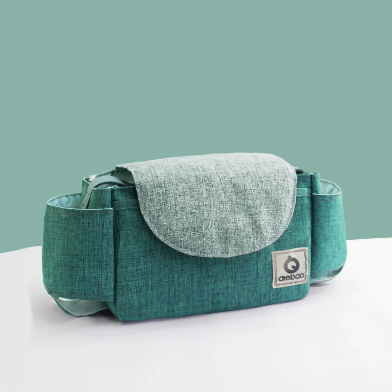 Sac à langer pour poussette organizer bébé rangement pratique design moderne couleur turquoise et gris accesso
