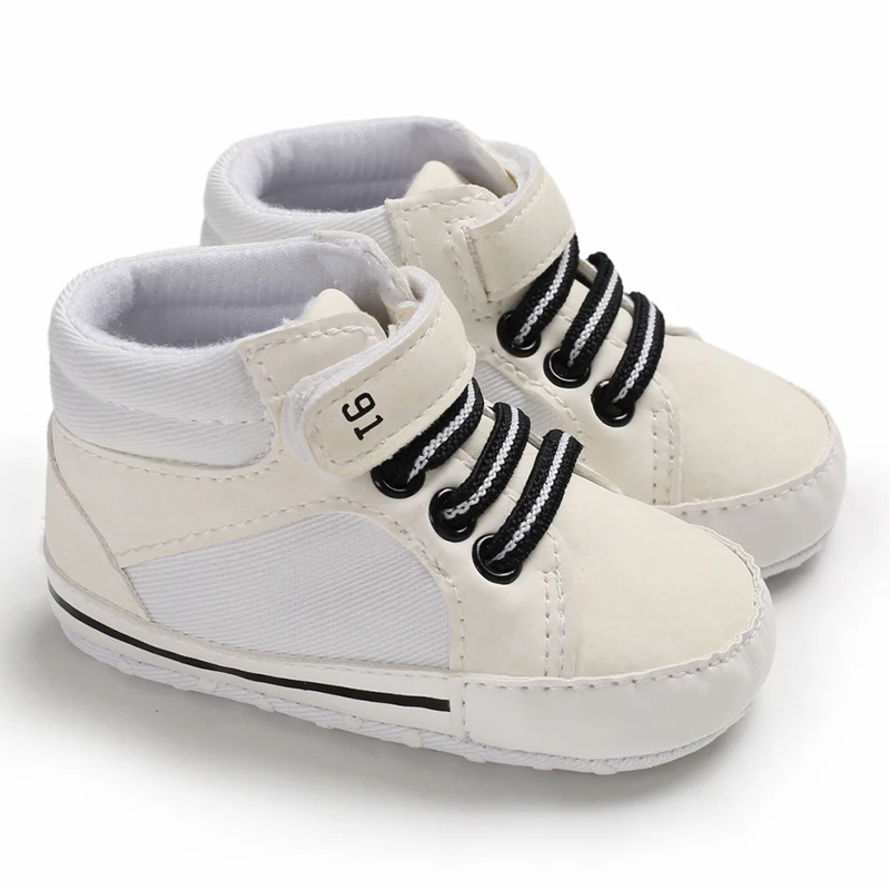 Chaussures bébé garçon baskets montantes blanc noir semelle caoutchouc