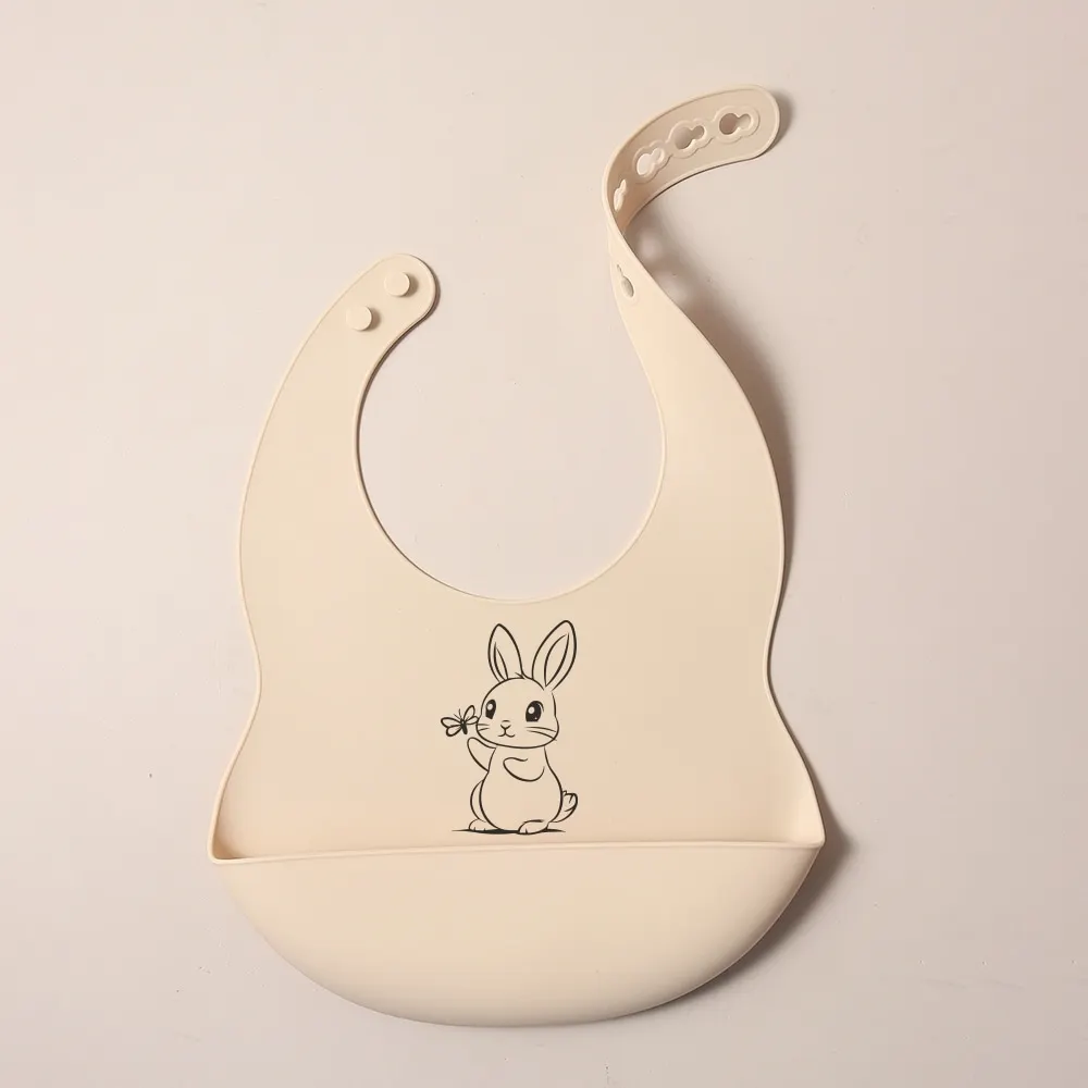 Bavoir en silicone pour bébé lapin en dessin animé beige poche intégrée bavoir réutilisable doux et sécuritair