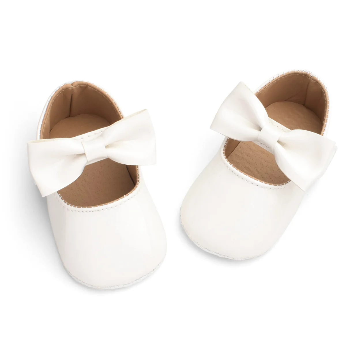 Chaussures bébé fille premiers pas nœud couleurs variées matière douce