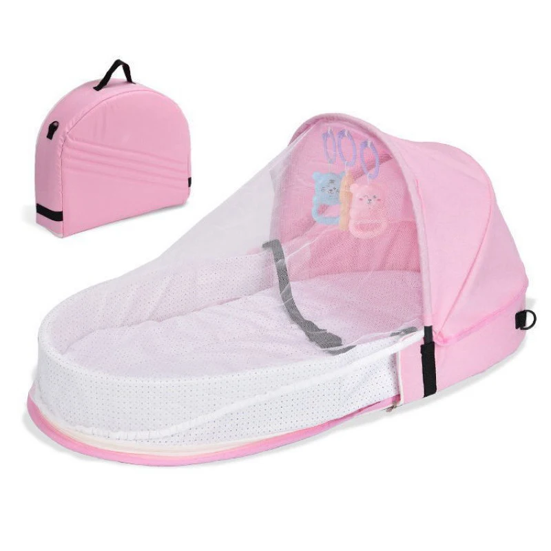 Bassinet pliable multifonction pour bébé moustiquaire intégrée lit portable rose incluant jouets suspendus et