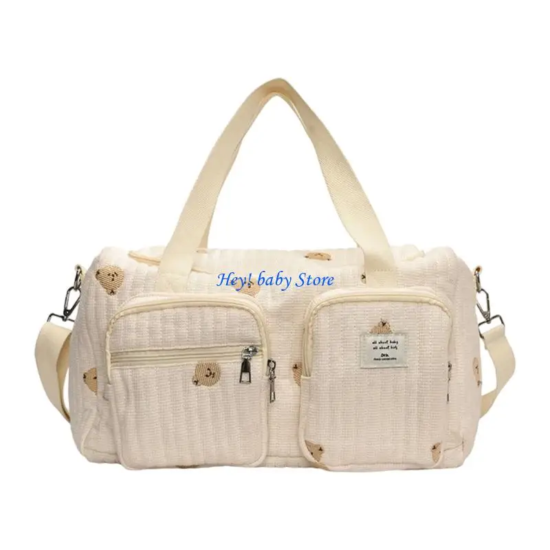 Sac à couches bébé portable bandoulière ajustable style ours mignon tissu doux motifs enfantins design moderne