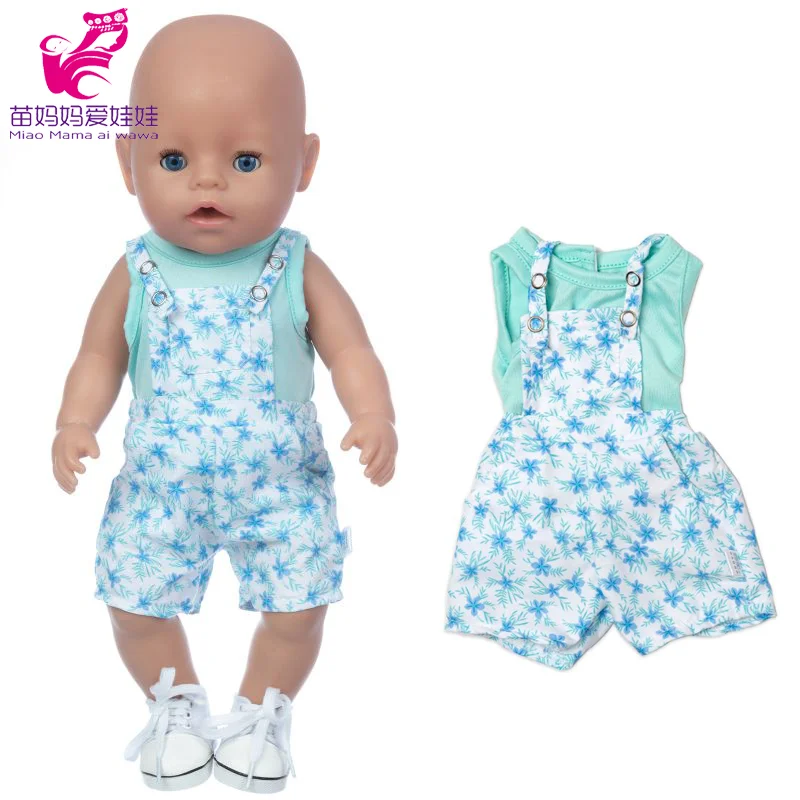 Poupée bébé imitation accessoires vêtements blanc fleurs bleu vert
