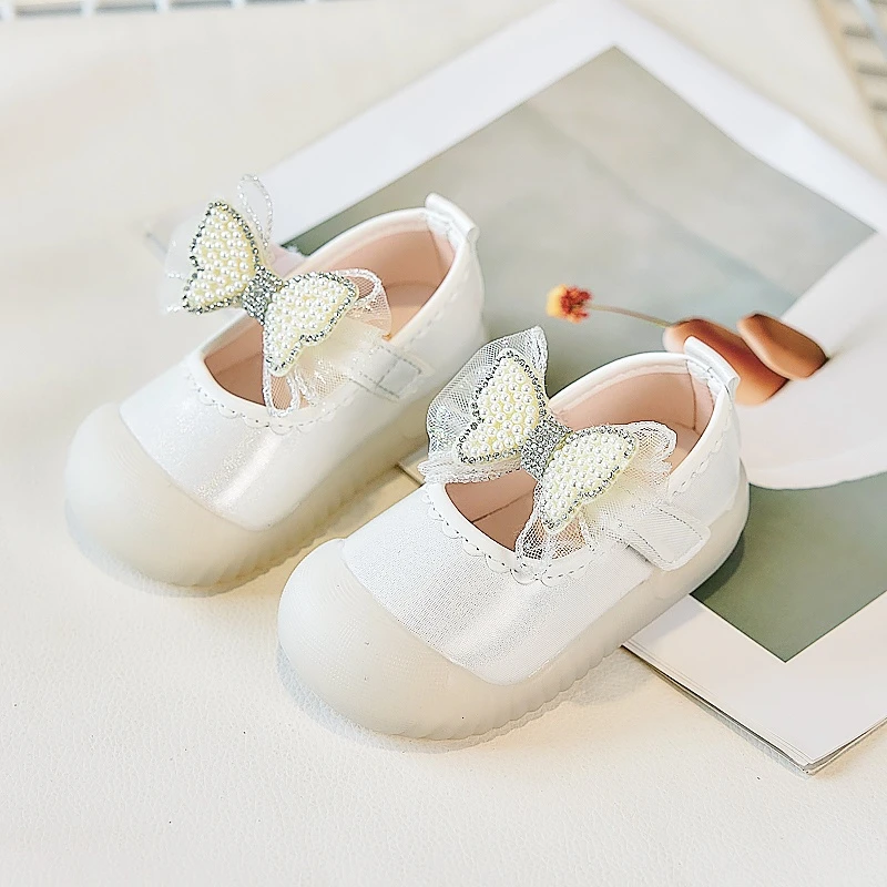 Chaussures de marche bébés filles nœuds dentelle plates couleur unie mode 2025 princesse polyvalentes 1625 bei
