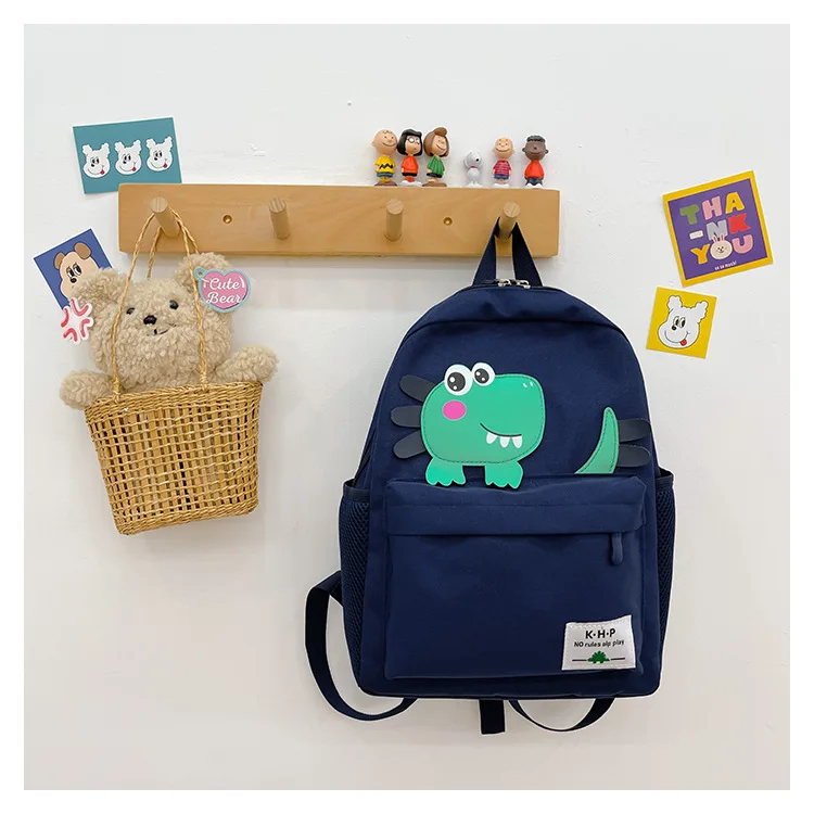 Sac à dos pour enfants dinosaure design moderne couleur bleu et vert Adjustable straps matériau durable cadeau