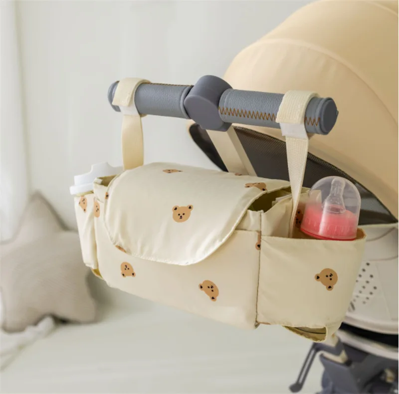 Sac de rangement pour poussette design ours compartiment biberon pratique et moderne accessoire bébé portage s