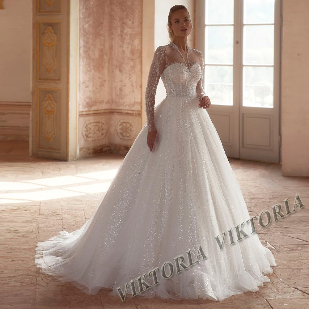 Robe de mariée Viktoria Glamour Perles tulle manches longues plissée traîne personnalisable élégance intempore