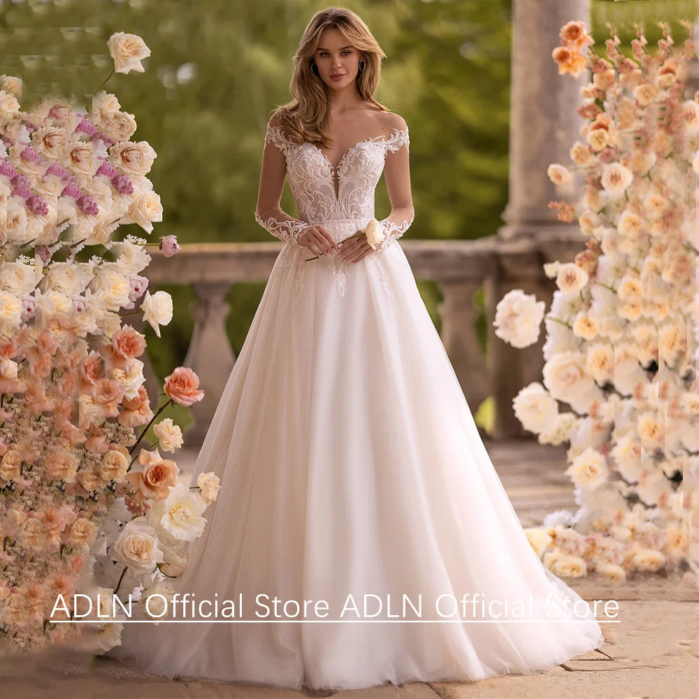 Robe de mariée sexy personnalisée manches longues transparentes col rond perles appliquées ligne A robe en tul