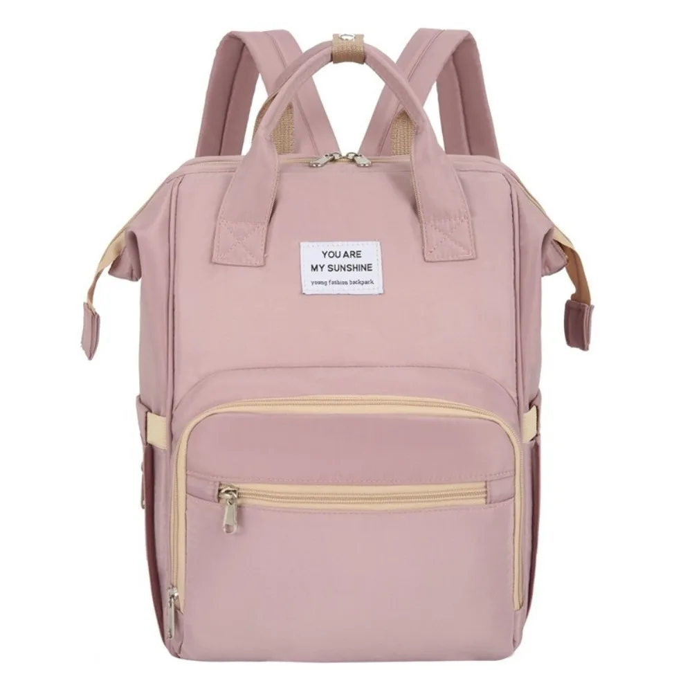 Sac à dos maman multifonctionnel portable grand compartiment bretelles ajustables design moderne violet rose p