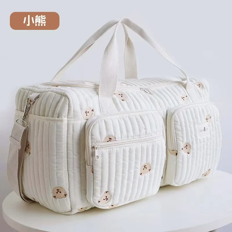 Sac à couches pour bébé sac de voyage à motif floral brodé tissu en coton beige fermeture éclair poignées renf