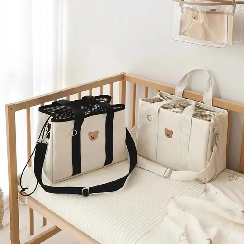 Sac à langer multifonctions en tissu durable pour maman et bébé style moderne pratique et sécurisé