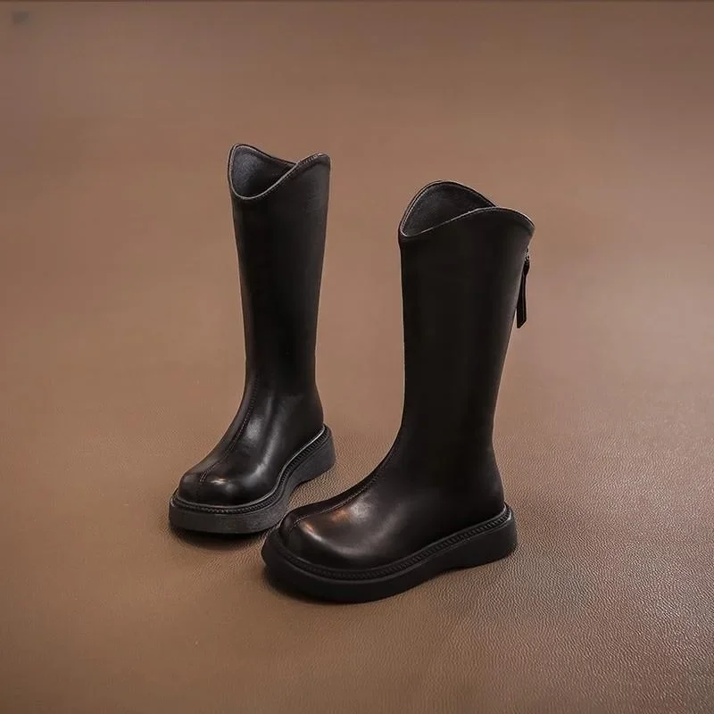 Bottes élégantes femme cuir noir semelle caoutchouc fermeture éclair