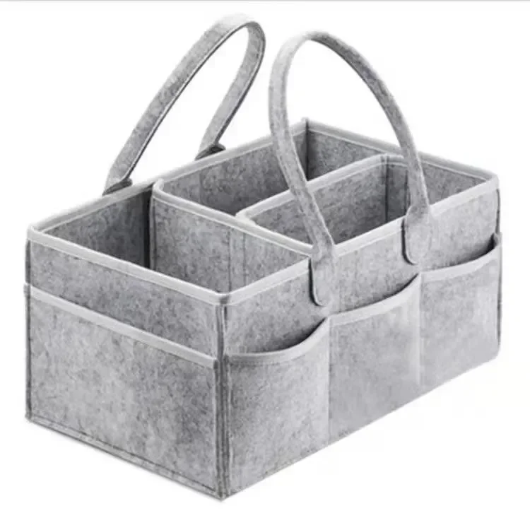 Caddie à couches bébé rangement 3 compartiments poignées latérales