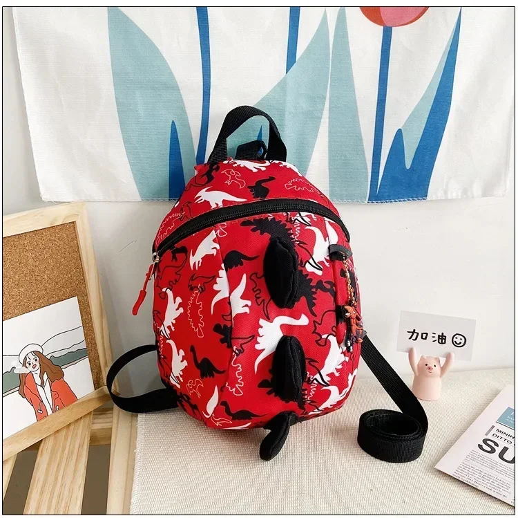 Harnais de sécurité dinosaure pour bébé sac à dos antiperte confortable pour enfant en bas âge style streetwea