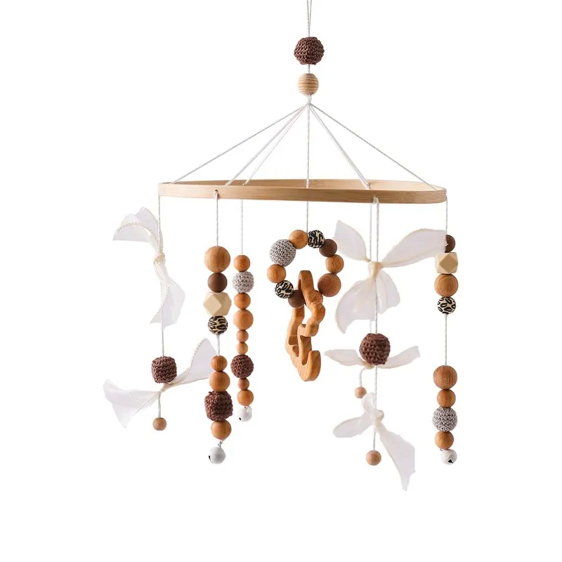 Mobile bébé en bois naturel perles colorées tissu doux stimulation visuelle chambre bébé 012 mois design épuré