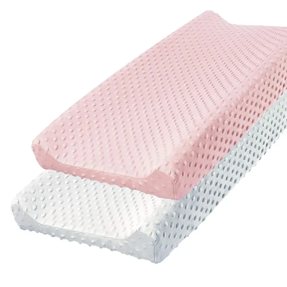 Coussin de soutien cervical en mousse synthétique housse texturée blanc et rose design moderne confort nocturn