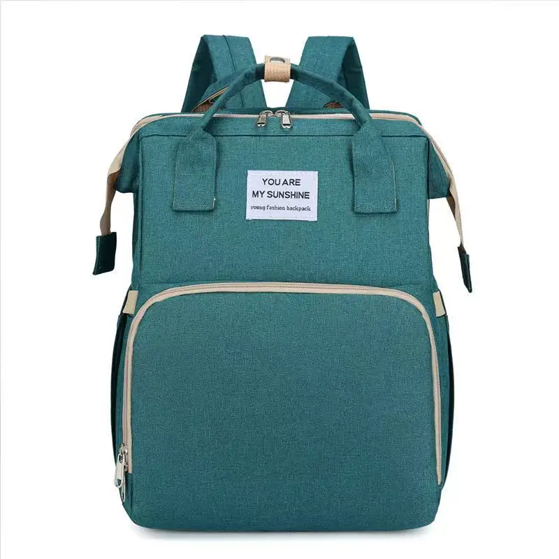 Sac à dos pliable maman grande capacité portable écoresponsable tissu durable idéal pour sorties bébé