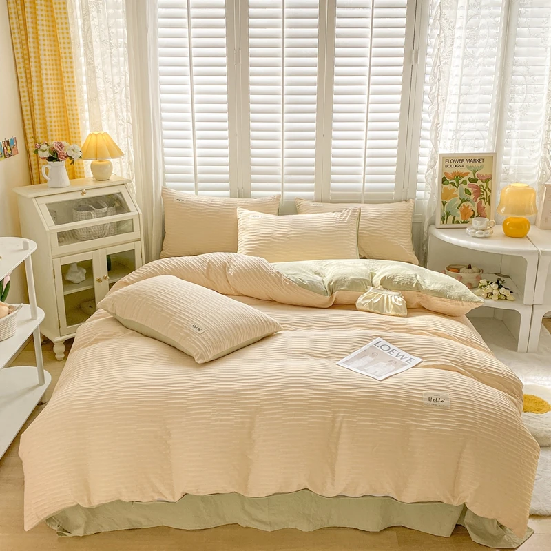 Ensemble de literie nordique en coton doux couette et oreillers assortis style minimaliste couleurs apaisantes