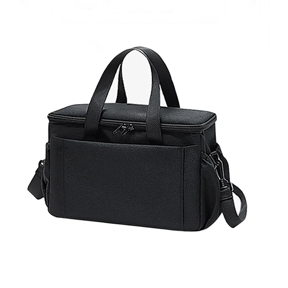 Sac de poussette en tissu synthétique noir design moderne et minimaliste port à l'épaule et à la main sac à do