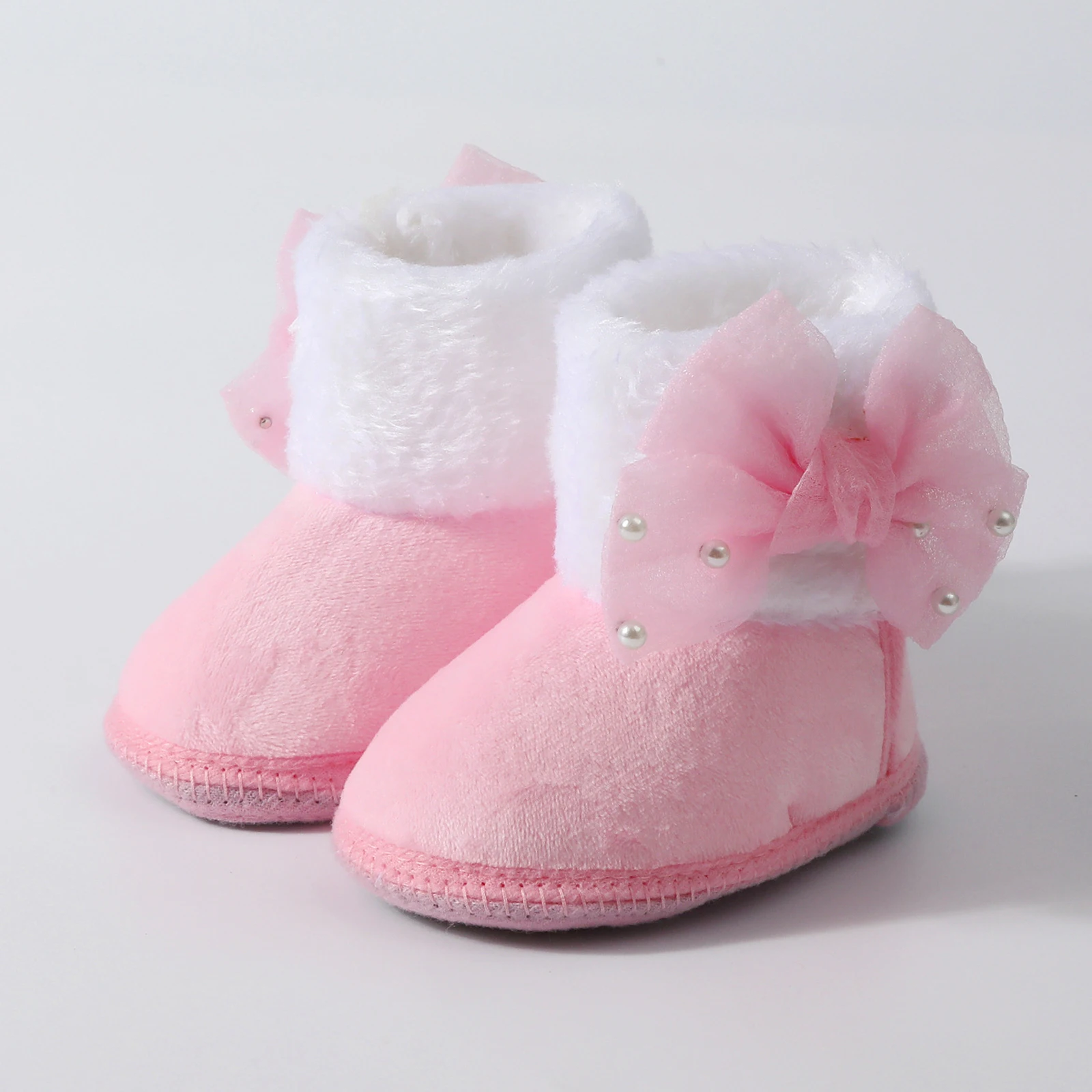 Bottines bébé fille intérieur rose pastel fourrure faux confortables douces adorables design mignon premier ma