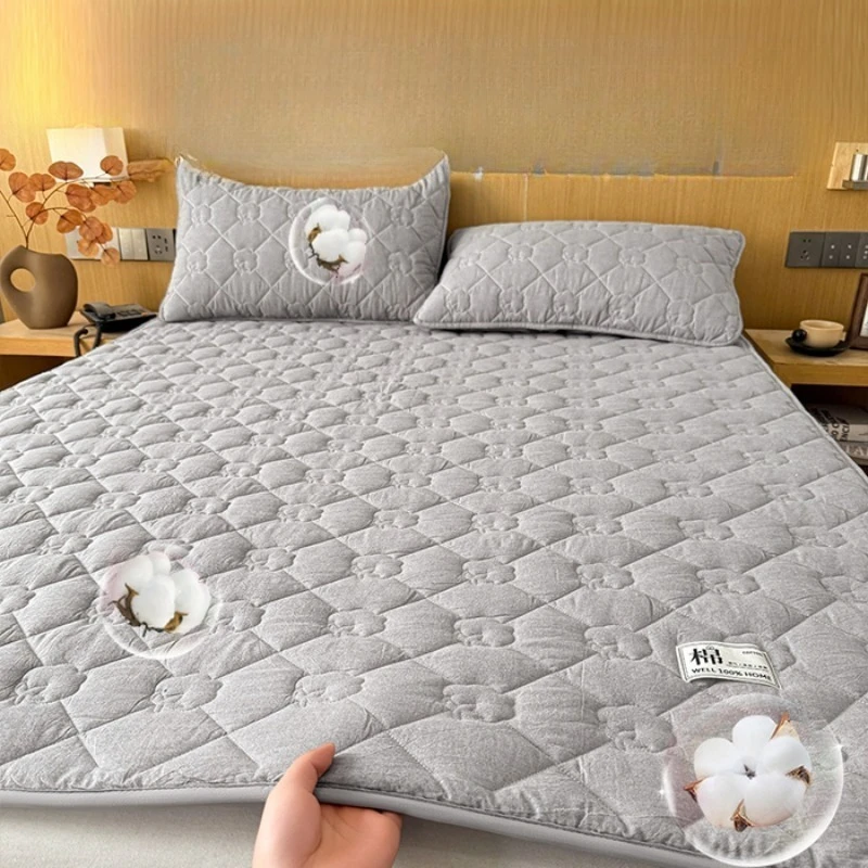 Surmatelas coton polyester matelassé gris pour lit bébé confortable