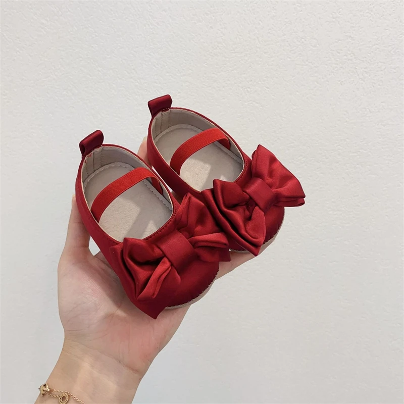 Chaussures de marche bébé fille ballerines satin rouge nœud semelle douce antidérapante occasionnelles 01 ans