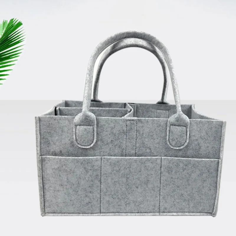 Panier organisation couches bébé feutre doux compartiments design moderne durable nursery caddie bébé