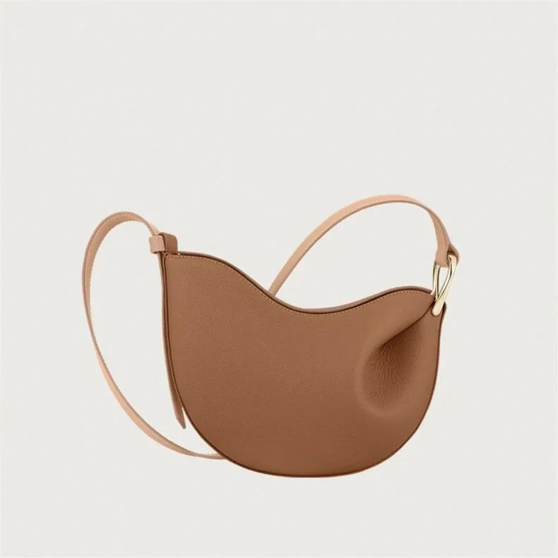 Sac fourretout cuir souple design plissé minimaliste sac crossbody portable à double usage style moderne éléga