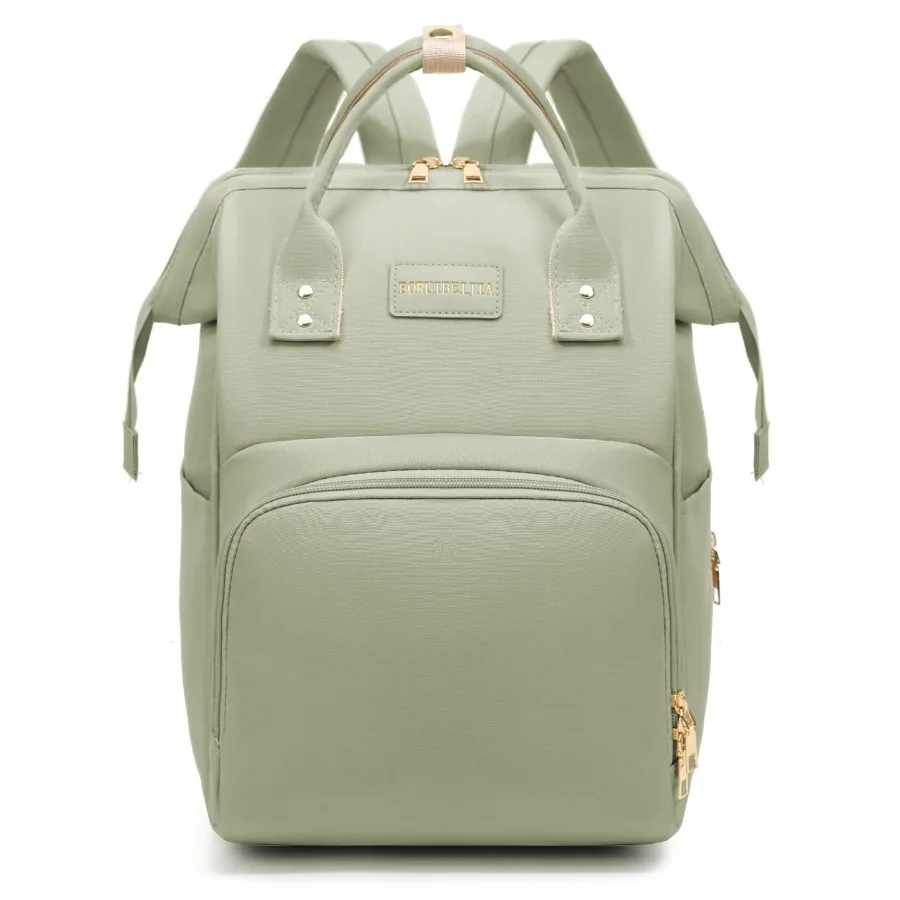 Sac à dos voyage bébé matériau simili cuir style moderne poche zippée bretelles ajustables couleur verte sac à