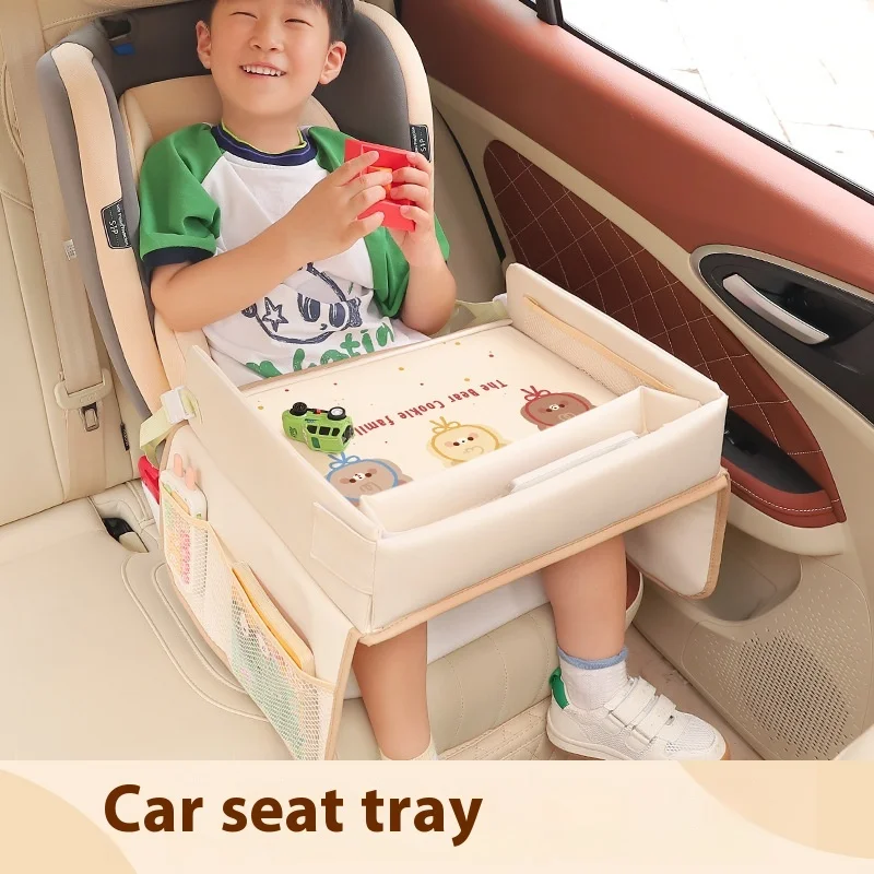 Plateau siège voiture enfant pliable poches intégrées étanche portable design moderne sécurisé usage multiple 
