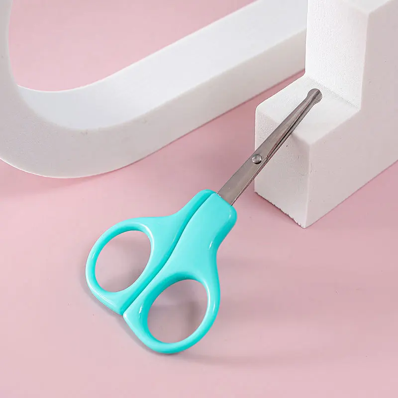 Ciseaux pour enfants sécurité design moderne turquoise argenté poignées larges matériaux sûrs activités manuel