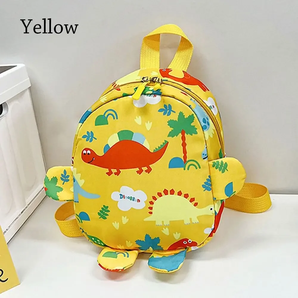 Sac à dos dinosaure pour enfants sac d'école ludique ajustable matériaux polyester design coloré motifs dinosa