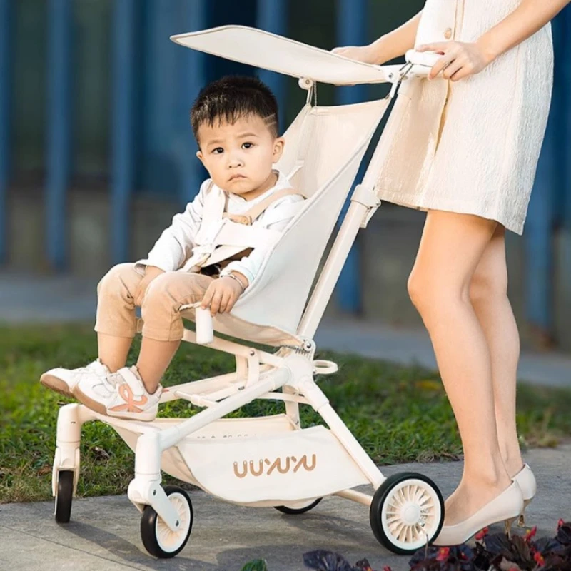 Poussette de voyage ultralégère pour bébé vue haute portable confortable 4 roues amorti intégré aluminium blan