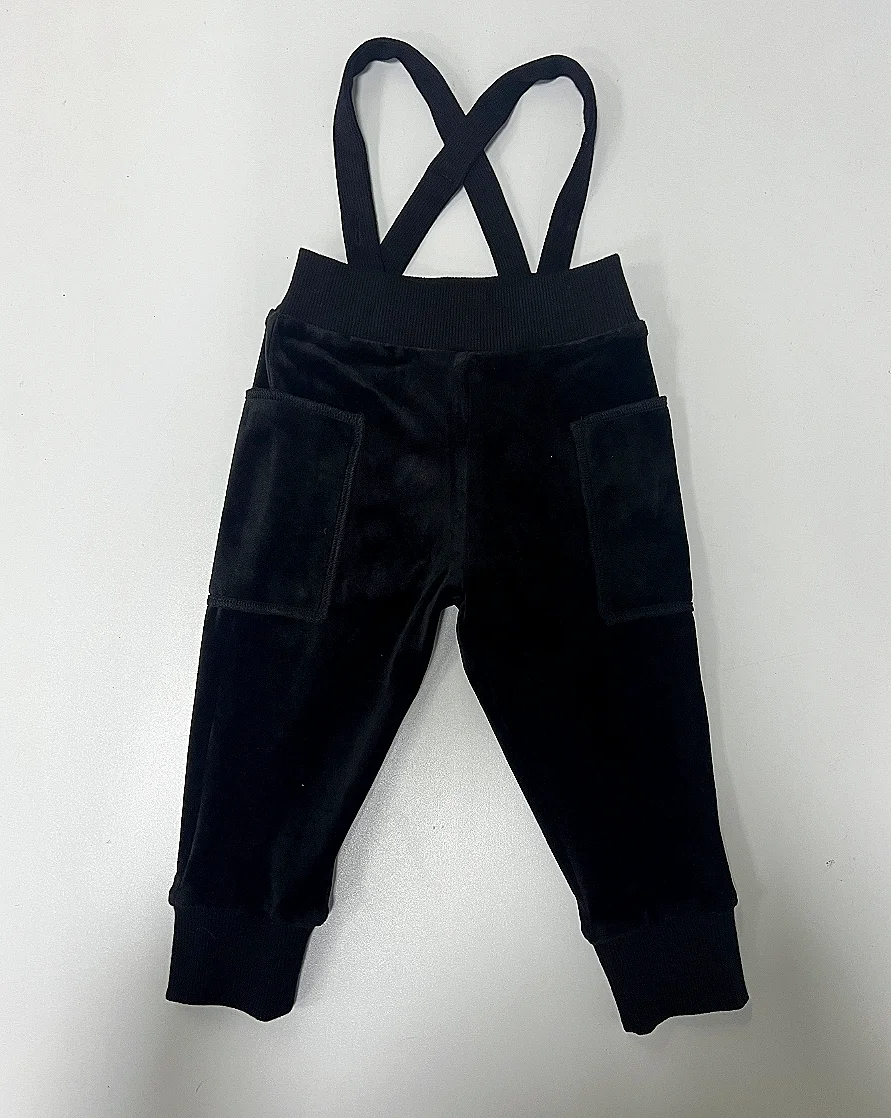 Pantalon bébé en velours noir à bretelles croisées coupe décontractée