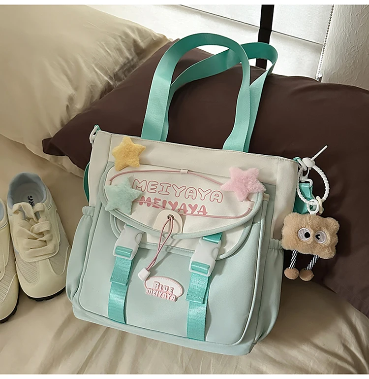 Sac d'école style japonais kawaii pour filles en nylon sac à dos et bandoulière design étoiles et pendentif