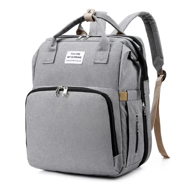 Sac à dos moderne pour maman élégante sac à couches pratique style minimaliste confortable et sécuritaire idéa