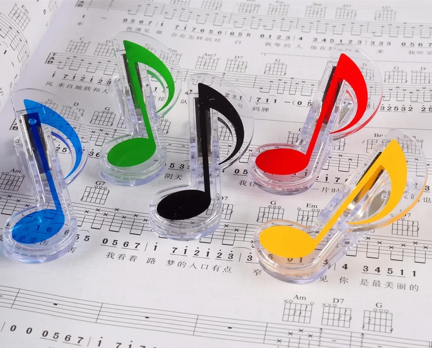 Marquepages en forme de note de musique accessoire ludique pour livres couleur variée plastique transparent 3