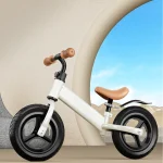 Vélo d&rsquo;équilibre léger pour enfants 26 ans sans pédales cadre métal poignées caramel design moderne pneus caoutchouc durable sécuritaire