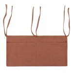 Tablier coton rangement nouveauné poches ajustables protection vêtements organisation bébé nursery accessoire pratique