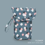Sac à langer bébé floral imperméable design moderne boutonpression poignée matériau synthétique rangement pratique grande capacité
