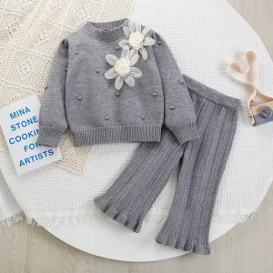 Ensemble hiver bébé fille pull et jupe tricot fleurs look mignon et confortable Ensemble hiver bébé fille pull et jupe tricot fleurs look mignon et confortable