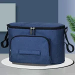 Glacière isotherme portable tissu denim sac de rangement poussette poche zippée poignées latérales usage extérieur design moderne couleur bleu délavé