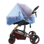 Poussette modulaire bébé design moderne protection antimoustiques tissu transparent châssis métallique couleurs élégantes fonctionnalité optimisée promenades sécurisées confort enfant