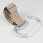 Crochet poussette en cuir et métal accessoire bébé fixation clés et sacs design moderne robuste couleur beige