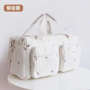 Sac à langer floral en coton sac à main polyvalent pour maman motifs fleuris fermeture éclair poches zippées tissu matelassé beige portable pratique bébé