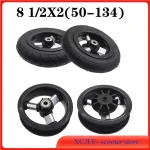 Roues pour poussette tricycle bébé 8.5 pouces moyeux intégré XCJI durable adhérence optimale ride fluide urban mobility bébé confort aluminium et caoutchouc noir