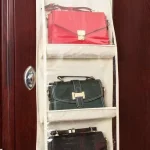 Organisateur suspendu de sacs à main rangement vertical tissu Oxford 3 compartiments design moderne économies d&rsquo;espace idéal pour vestiaires