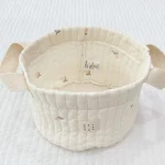 Panier de rangement bébé en coton doux design floral pastel anses robustes organisation chambre bébé lit jouets literie maman S flower