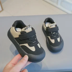 Baskets anticoup de pied pour enfants chaussures de sport enfants semelle souple facile à enfiler style moderne noires avec accents beige JPT 2025 Baskets anticoup de pied pour enfants chaussures de sport enfants semelle souple facile à enfiler style moderne noires avec accents beige JPT 2025