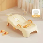 Chaise de bain pliable pour bébé transat bébé tabouret de bain réglable sécurité bébé drainage poignées renforcées jaune et orange style enfantin motifs lapin